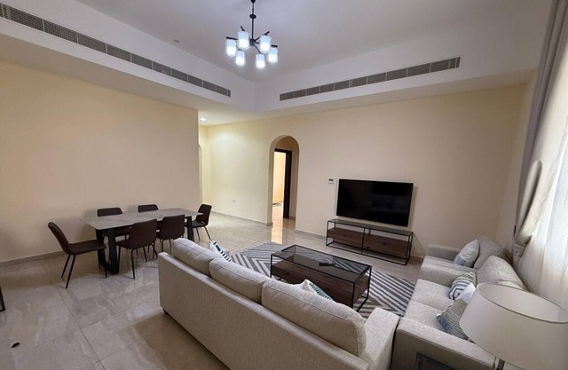 Spacious 4-bedroom apartment with WiFi, AC in terrific Shakhbout City