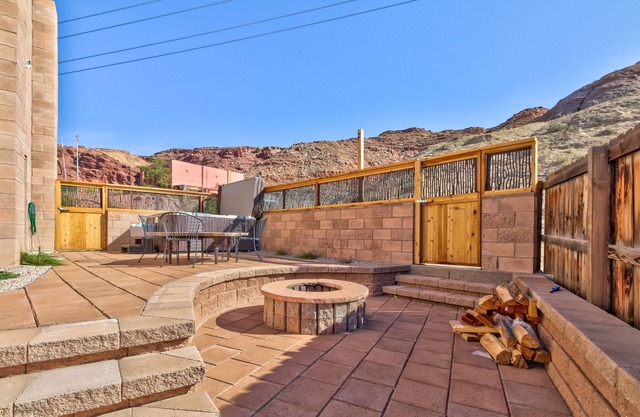 Spacious Condo with Private Hot Tub & Firepit - Steps from Downtown