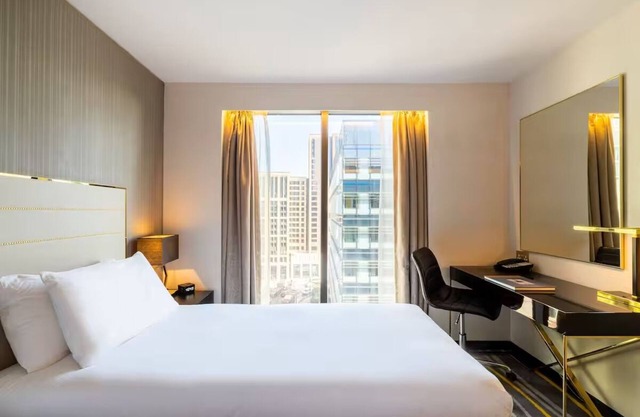 Spacious Deluxe King Room, City Views, Steps from the Tube