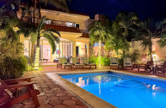 Spacious Hacienda style home with charming garden, screened porch and pool