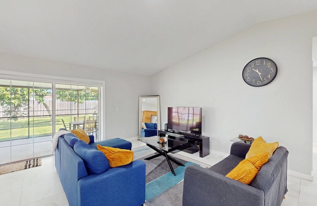 Spacious home with enclosed yard , fire pit and playground