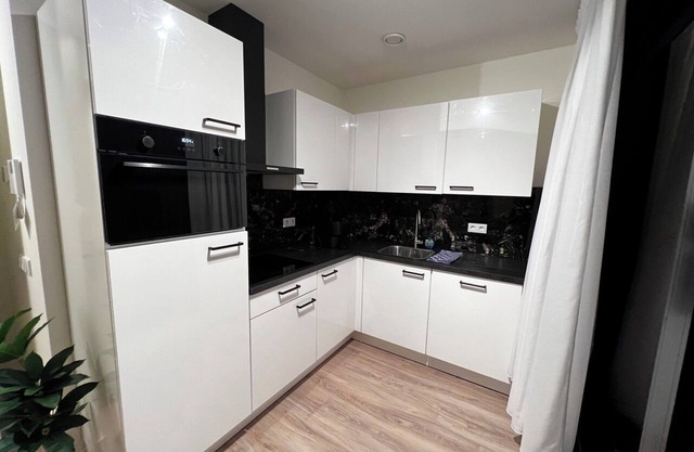 Spacious stay with parking, WiFi, and garden views. Close to nature reserves and shops. Sleeps four.