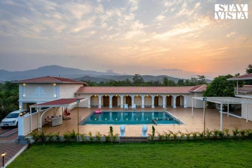 StayVista at Rio Vista with Pool, Lawn, Music Speaker & Game