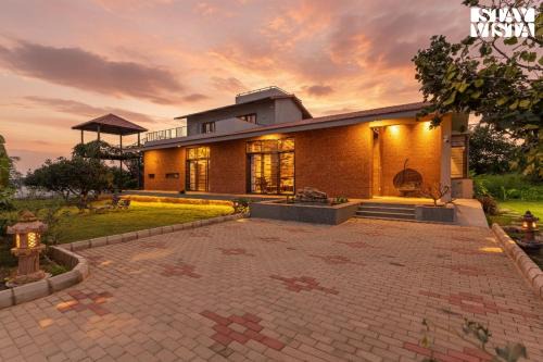 StayVista at Zen Grove with Bonfire, Lawn