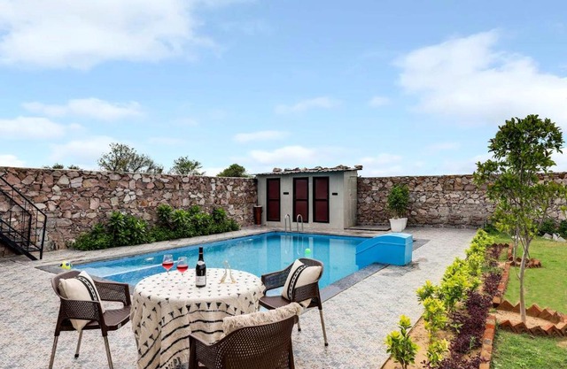 StayVista's La Villa Farm - Tranquil Retreat with Outdoor Pool, Games & Terrace