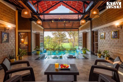 StayVista's Lumos Paradise - Villa with Infinity Pool, Terrace, Expansive Lawn & Gazebo