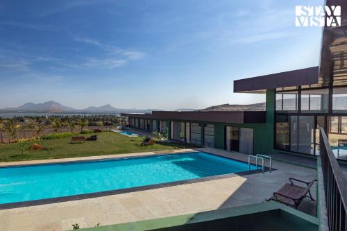 StayVista's Minty Mirage - Mountain & Lake-View Villa with Pool, Expansive Lawn & Terrace