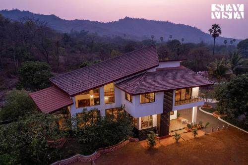 StayVista's Valdivian Villa - Orchard Oasis with Contemporary Interiors & Lush gardens