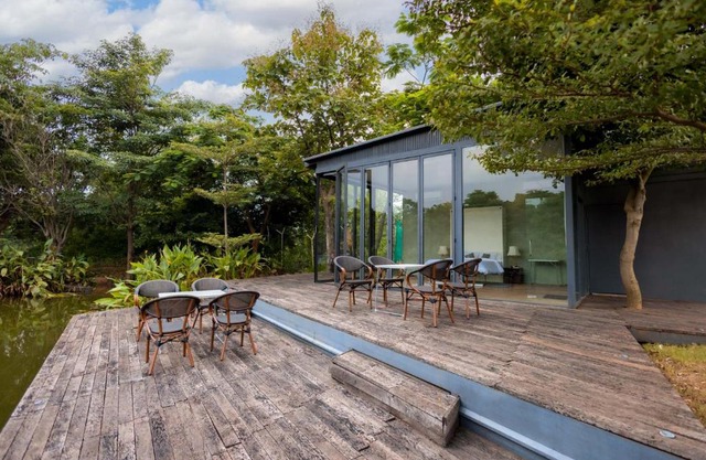 StayVista's Water Song Garden - Lake-Side, Pet-Friendly Villa with Bar, Spacious Lawn & Indoor-Outdoor Games