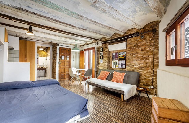 Studio Apartment 'Loft 1º with Roof Terrace' with Balcony, Wi-Fi and Air Conditioning