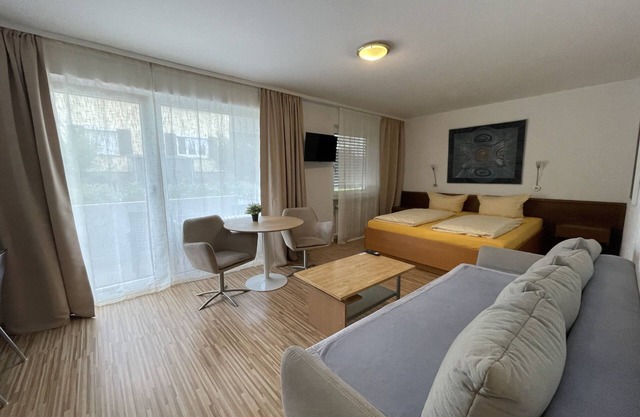 Studio with balcony and a sofa