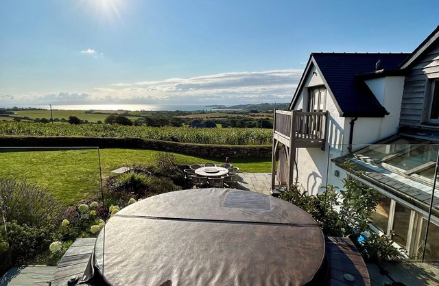 Stunning 8 Bedroom Home w/Hot Tub and Coastal Views!