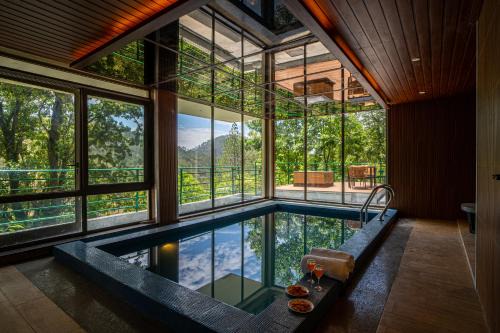 Stunning Hillside 3 BHK Gateway With Indoor Pool, Attic and Classy Interiors