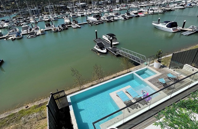 Stunning Luxury Waterfront Retreat – Sleeps 12, Pool, Spa & Entertainment Galore