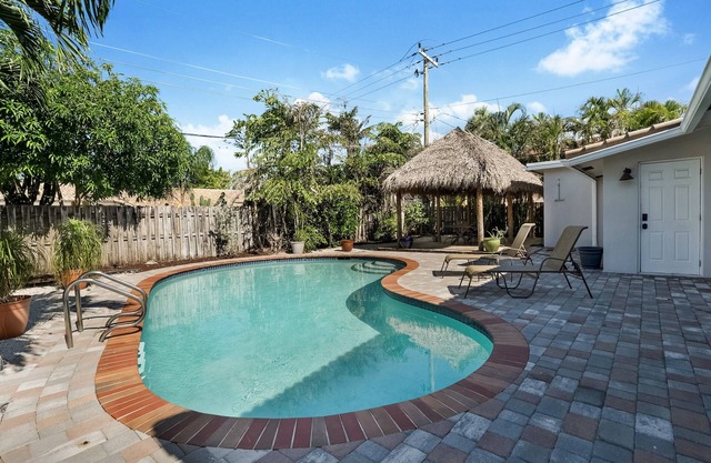Stunning Tropical 3BR Oasis with Pool & Tiki Hut
