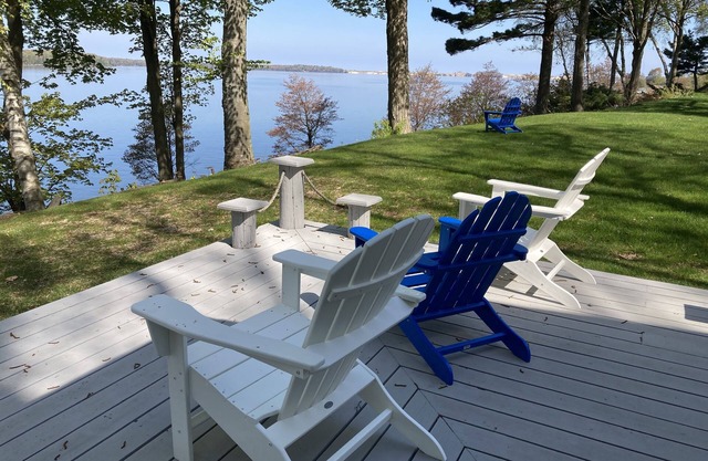 Stunning view of Hamlin Lake, w/deck, fire-pit, screened in porch. Sleeps 6.