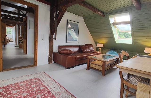 Stylish listed house. With sauna, fitness studio and a small garden. Bathing pond.