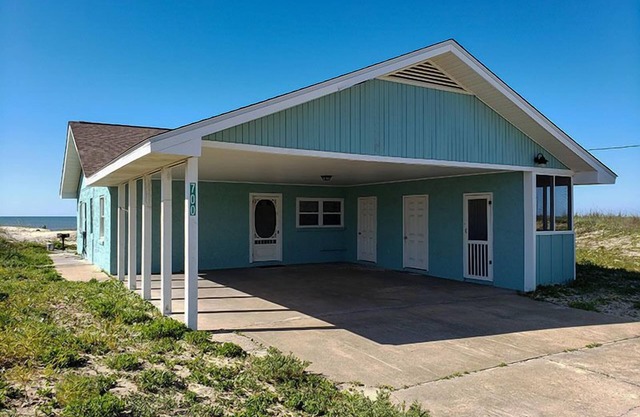 SUMMER BREEZE WILL MAKE YOU FEEL FINE when you escape to this sunny beachfront home!