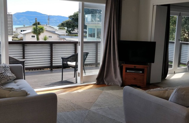 Sun trap by the beach!