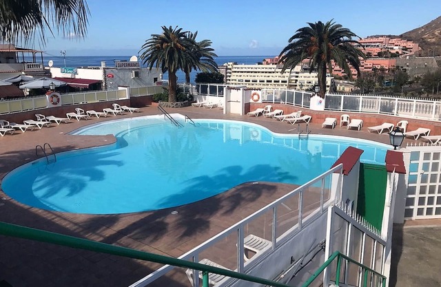 Sunset terrace with ocean views and pool access!