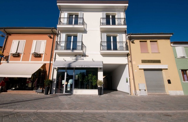 Superior room with balcony overlooking the canal port of Cesenatico