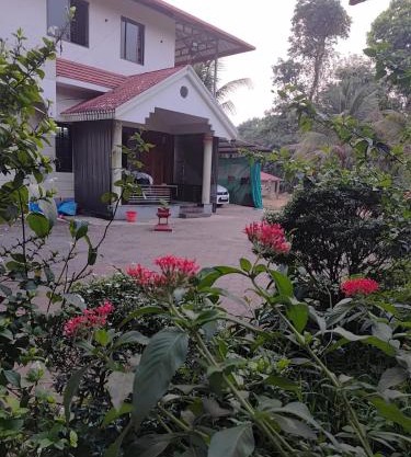 Suvarna TOURIST HOME