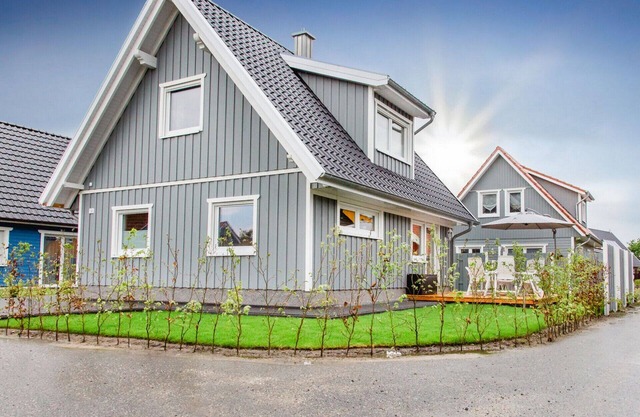 Swedish-style vacation home with sauna, bathtub, fireplace, garden