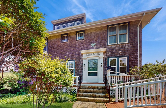 Sweeping, dog-friendly, waterfront home w/a sun room, ocean views, & fireplaces