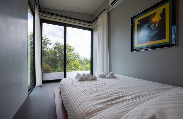 Swimming pool along the terrace, panoramic view surrounded by nature