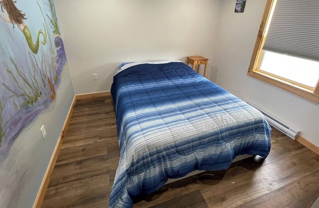 The Blue House in the Orchard