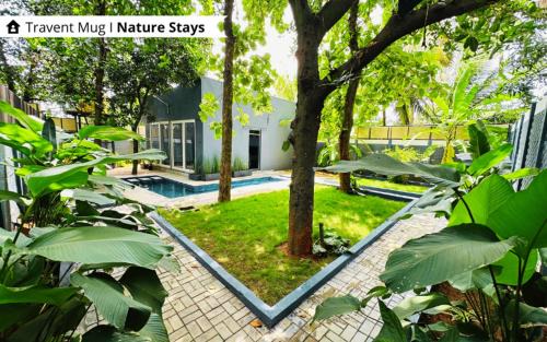 The Calms Villa by Travent Mug