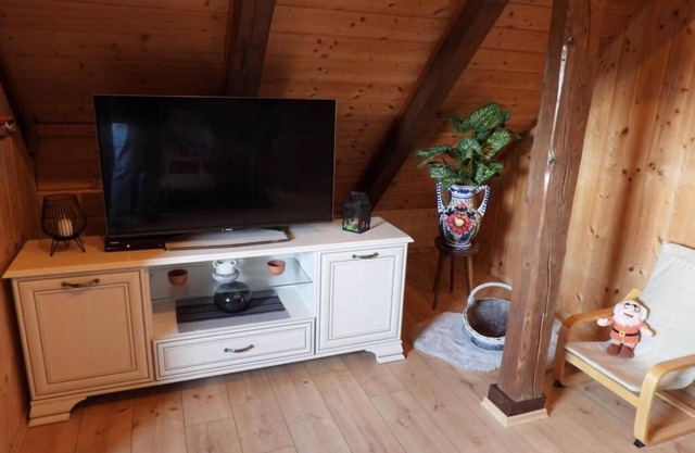 The cozy vacation home offers a hot tub and peace.