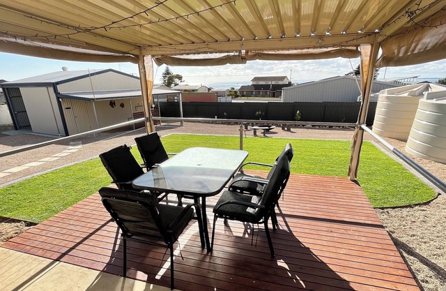 The Lighthouse - lovely 3 bedroom home- Sea glimpses from the back deck!