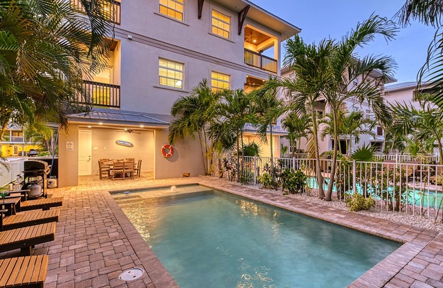 The Nautilus | Luxury Pet Friendly Home, 2 Heated Pools, Ping Pong Tables Steps to Beach!
