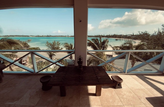 The Penthouse with sweeping views of Cocoa bay beach , green turtles & Rays