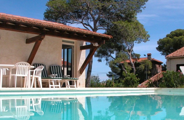 The Poolhouse studio + shared private heated pool