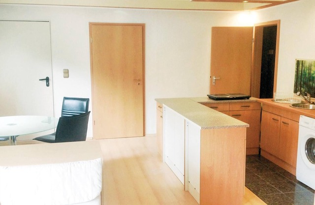 The spacious, bright apartment is located in the basement of the beautiful Villa Pegasus with a view