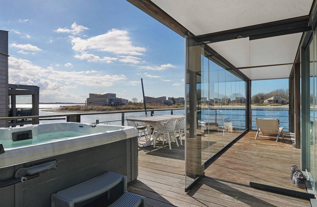 The terraces of a 4-person Villa Super VIP are located directly by the water, with access to a private swimming pier, jacuzzi and Infrared sauna.