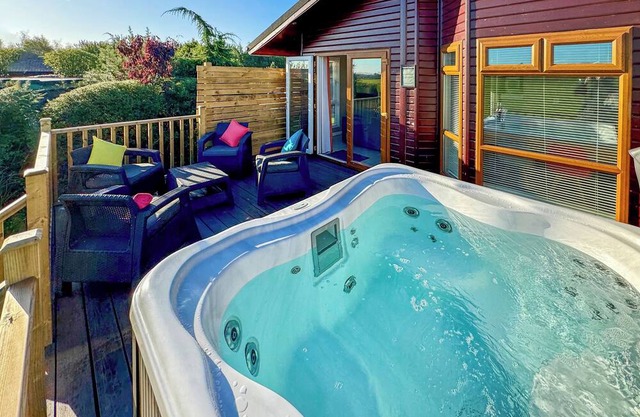 This deluxe two bedroom lodge even has its own games den.