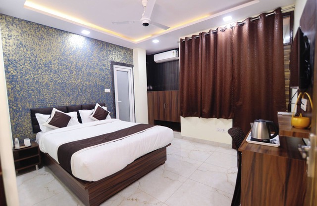 This room features a spacious king-sized bed, designed for maximum comfort
