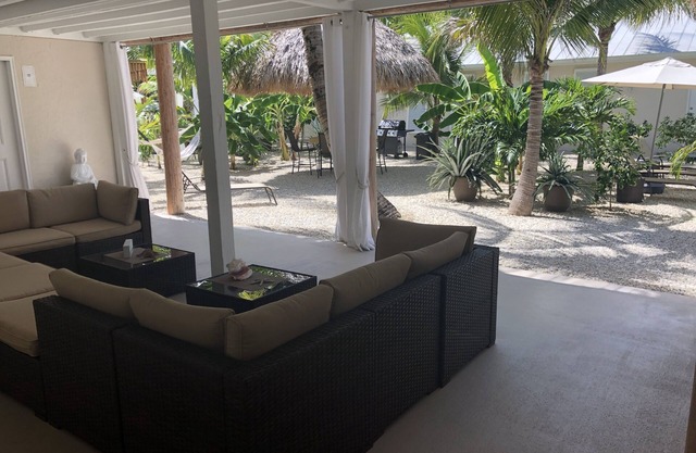 Tiki Garden Getaway SPA and outdoor living. Close to beaches without the costs!