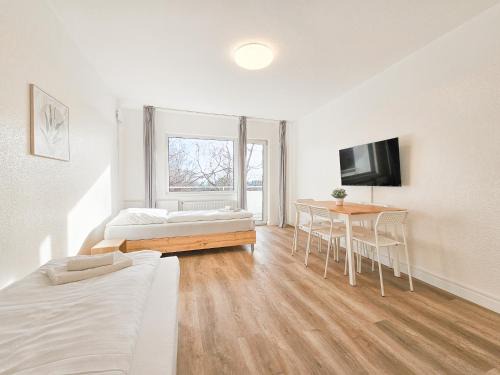 Tolstov Apartments - Monteurwohnungen - 2 Schlafzimmer - Küche - Balkon - Waschmaschine - 25 Min zur Messe DUS