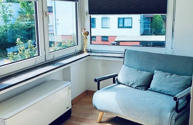 Top floor apartment with conservatory perfect for a couple or one person