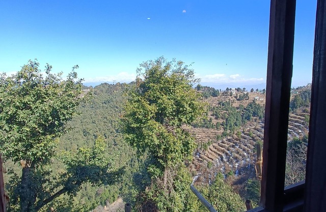 top of the mountain surrounding with nature view and snow caped mountains view f