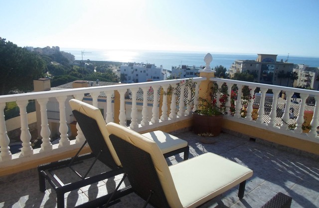 Town house with shared pool and stunning roof terrace, close to the beach