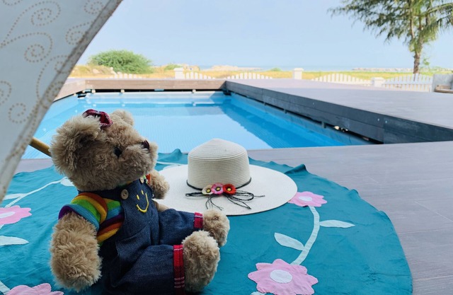 Traditional Northern Thai beach house with a swimming pool