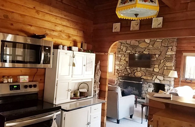 Tree swing, Outdoor dining with Stream and Fire Pit, Large Yard, Sunroom, Trail