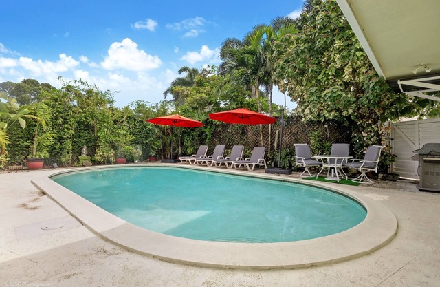 Tropical 3BR Escape w/Pool, 7 Min Drive to Beach