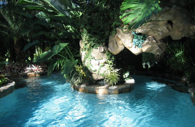 Tropical House with 80' boat dock and waterfall pool on the New River