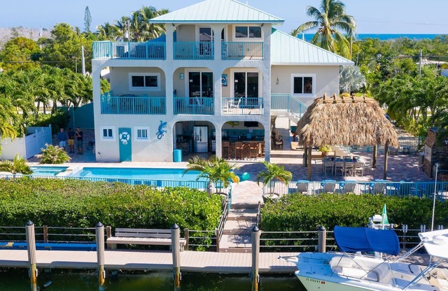 Tropical Luxury Sombrero Beach Rd – 6BR Waterfront Oasis w/Pool, Hot Tub, Dock,